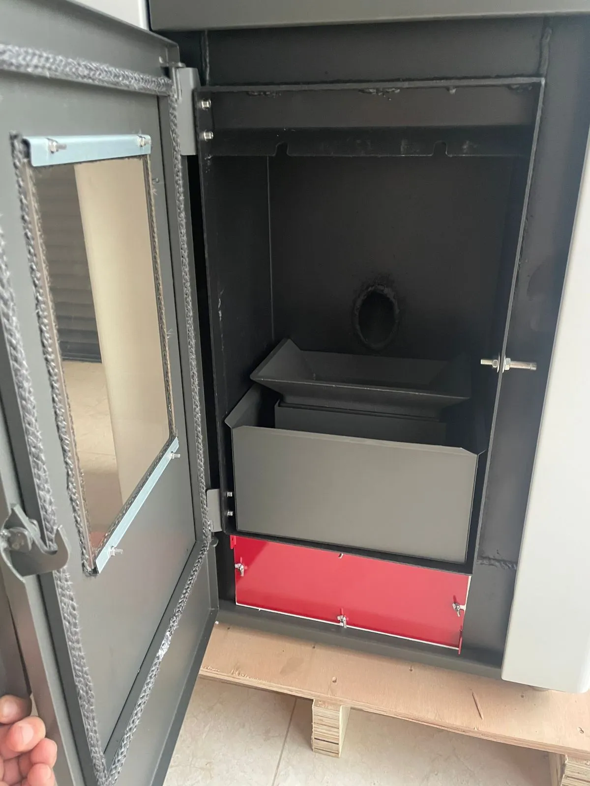 Fire door open on the 30KW hydro stove