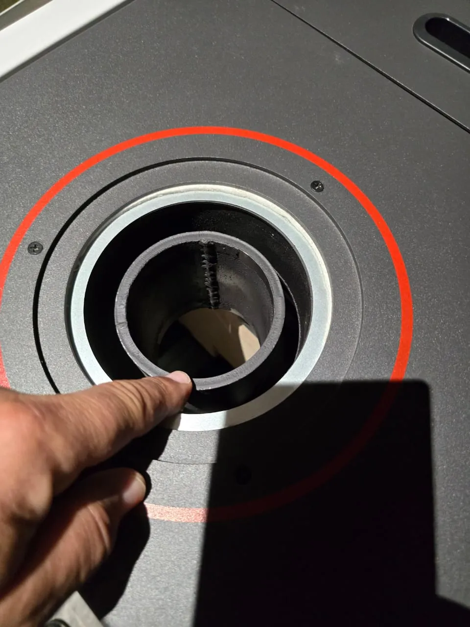Close-up of the silver cooktop ring on top of the stove